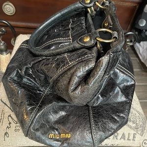 Miu Miu large black distressed leather bag